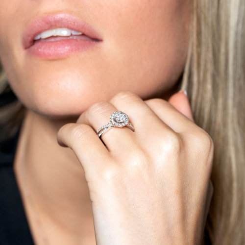 Image of diamond ring on model's finger.