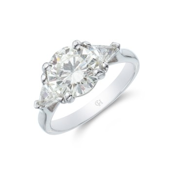 Platinum Brilliant and Trillion Cut 3.25ct Diamond Three Stone Ring