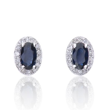 9ct White Gold Oval Cut 0.70ct Sapphire and 0.10ct Diamond Halo Stud Earrings