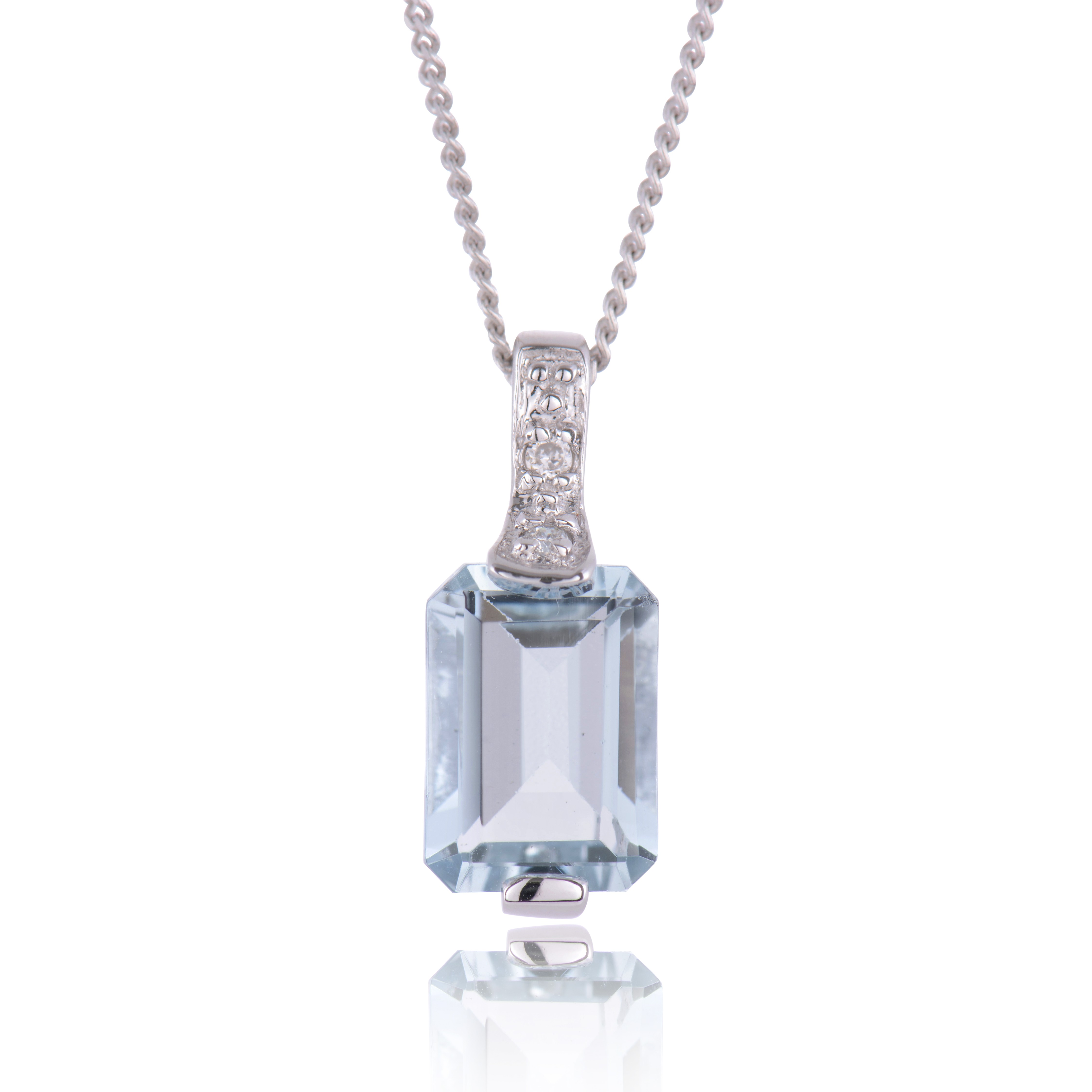 9ct White Gold Emerald Cut Aquamarine and 0.02ct Diamond Pendant