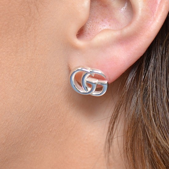 Silver interlocking g earrings clearance