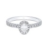 Platinum Oval Cut 0.60ct Diamond Halo Solitaire Ring