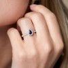 18ct White Gold Pear Cut 0.39ct Sapphire and 0.40ct Diamond Halo Ring