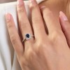 18ct White Gold Octagonal Cut 0.70ct Sapphire Halo Ring with Diamond Shoulders