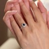 18ct White Gold Octagonal Cut 0.70ct Sapphire Halo Ring with Diamond Shoulders