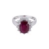 18ct white gold 2.70ct oval ruby and 0.64ct diamond cluster ring