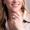 18ct White Gold Pear Shape 1.33ct Ruby Solitaire Ring with Traditional Diamond Halo