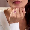 18ct White Gold Oval Cut 1.40ct Ruby Solitaire Ring with Diamond Set Halo and Shoulders