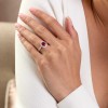 18ct White Gold Oval Cut 1.40ct Ruby Solitaire Ring with Diamond Set Halo and Shoulders
