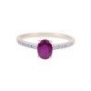 18ct Yellow Gold 1.25ct Oval Cut Ruby and 0.12ct Diamond Cluster Ring