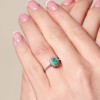 9ct White Gold 0.50ct Oval Emerald and 0.55ct Diamond Cluster Ring