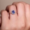 9ct White Gold Oval Tanzanite & Diamond Halo Solitaire Ring