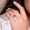 9ct White Gold Oval Tanzanite & Diamond Halo Solitaire Ring