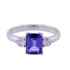 18ct White Gold Emerald Cut Tanzanite and Brilliant Cut Diamond 0.34ct Three Stone Ring