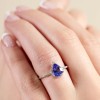 9ct White Gold Pear Cut Tanzanite 1.12ct Diamond Halo Ring