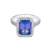 Platinum Emerald Cut 4.11ct Tanzanite and Diamond Halo Ring