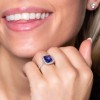 Platinum Emerald Cut 4.11ct Tanzanite and Diamond Halo Ring