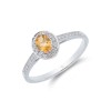 9ct White Gold Oval Cut Citrine 0.53ct Diamond Halo Ring