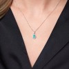 9ct White Gold 0.50ct Pear Cut Emerald and 0.19ct Diamond Halo Pendant