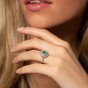 18ct White Gold 0.50ct Oval Cut Emerald and 0.47ct Halo Diamond Ring