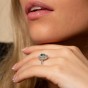 18ct White Gold 0.50ct Oval Cut Emerald and 0.47ct Halo Diamond Ring