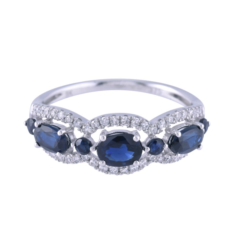 9ct White Gold 1.18ct Oval Cut Sapphire and 0.20ct Diamond Fancy Ring