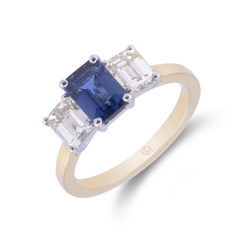 18ct yellow gold octagonal sapphire 1.29ct and emerald cut 1.26ct diamond 3 stone