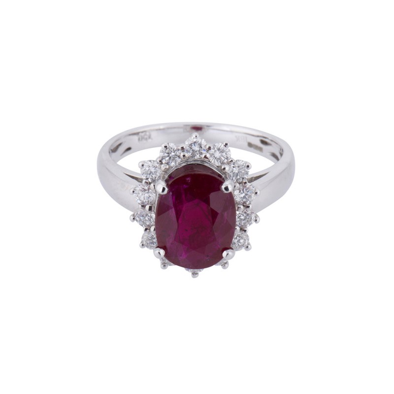 18ct white gold 2.70ct oval ruby and 0.64ct diamond cluster ring