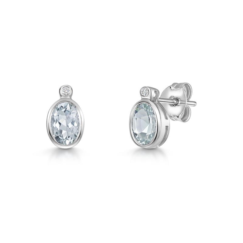9ct White Gold 1.00ct Oval Bezel Set Aquamarine and 0.12ct Diamond Earrings