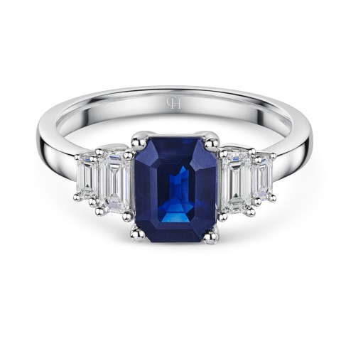 9ct White Gold Emerald Cut 3.00ct Sapphire and 0.45ct Diamond Five Stone Ring