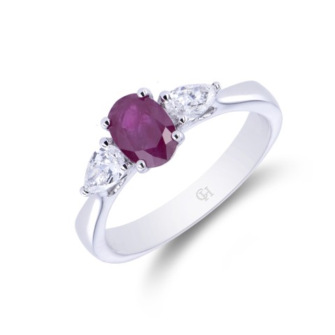 18ct White Gold Oval Cut Ruby and Brilliant Cut Diamond 1.16ct Three Stone Ring