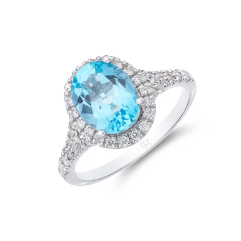 18ct White Gold Round Brilliant Diamond 0.23ct and Oval Blue Topaz 2.00ct Halo Ring