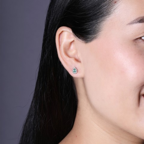 9ct White Gold Pear Cut Emerald 0.39ct Diamond Halo Earrings