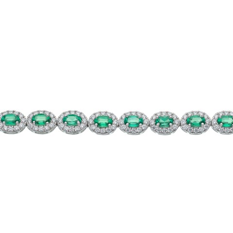 18ct White Gold Oval Cut Emerald 7.25ct Diamond Halo Bracelet