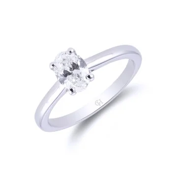 18ct White Gold Oval Cut Tanzanite and Brilliant Cut Diamond 3.12ct Three Stone Ring