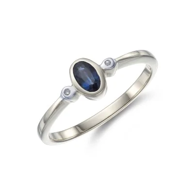 9ct Yellow Gold Diamond and 0.06ct Sapphire Bezel Set Ring