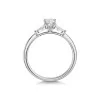 Platinum Pear Cut 0.40ct Diamond Solitaire Ring with Halo and Baguette Cut Shoulders