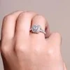 Platinum Emerald Cut 0.50ct Diamond Halo Solitaire Ring