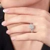 Platinum Oval Cut 0.33ct Diamond Halo Solitaire Ring