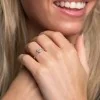 Platinum Oval Cut 0.60ct Diamond Halo Solitaire Ring
