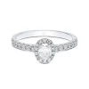 Platinum Oval Cut 0.60ct Diamond Halo Solitaire Ring
