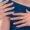 Platinum Round Brilliant 1.50ct Lab Grown Diamond Halo Ring with Diamond Shoulders