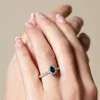 18ct White Gold Pear Cut 0.39ct Sapphire and 0.40ct Diamond Halo Ring