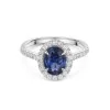 18ct White Gold Oval Cut 1.50ct Sapphire Ring with Diamond Halo and Shoulders