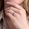 18ct White Gold Pear Shape 0.40ct Ruby Solitaire Ring with Traditional Diamond Halo