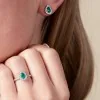 18ct White Gold 0.40ct Diamond And 0.38ct Emerald Pear Halo Solitaire