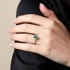 18ct White Gold Oval Cut 0.35ct Emerald and 0.49ct Diamond Halo Ring