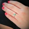 18ct White Gold Pear Cut Emerald and Diamond 0.87ct Three Stone Ring