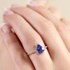 9ct White Gold Pear Cut Tanzanite 1.12ct Diamond Halo Ring
