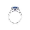 Platinum Emerald Cut 4.11ct Tanzanite and Diamond Halo Ring